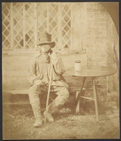 Man seated at table by John Whistler