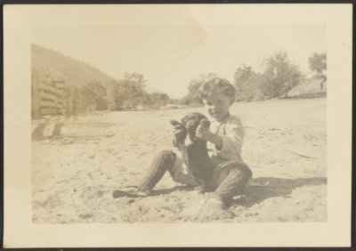 Boy and Dog on Beach by Louis Fleckenstein