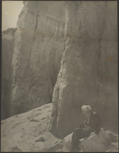 Elderly Man in Rocky Landscape by Louis Fleckenstein