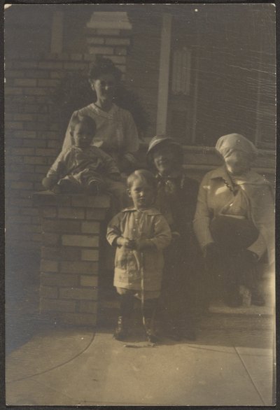 Family Portrait Outside House by Louis Fleckenstein