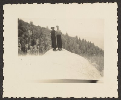 Figures Standing on Rock by Louis Fleckenstein
