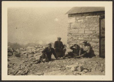 Figures and Stone Building by Louis Fleckenstein