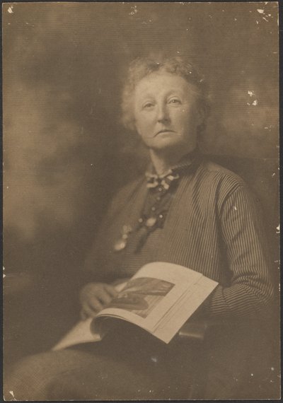 Woman Holding Magazine by Louis Fleckenstein