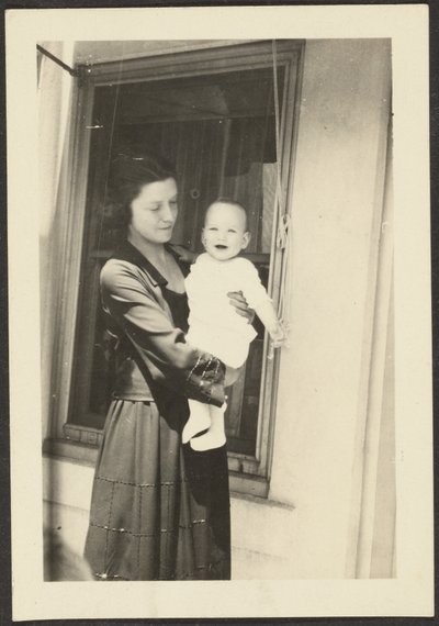 Woman Holding Smiling Baby by Louis Fleckenstein