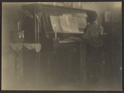 Woman Playing Piano by Louis Fleckenstein