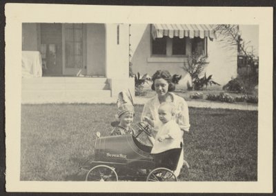 Woman with Children in Toy Car by Louis Fleckenstein