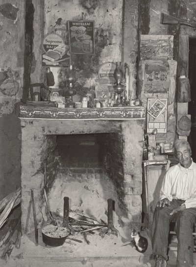 Man Near a Fireplace by Marion Post Wolcott