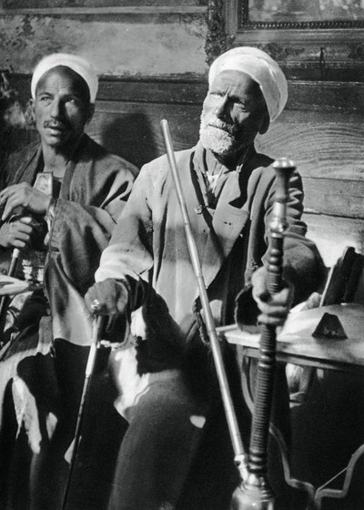 Smoking the narghileh, Cairo, 1937 by Martin Hurlimann