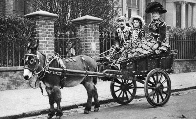 Pearly family in their donkey-drawn moke, London by McLeish