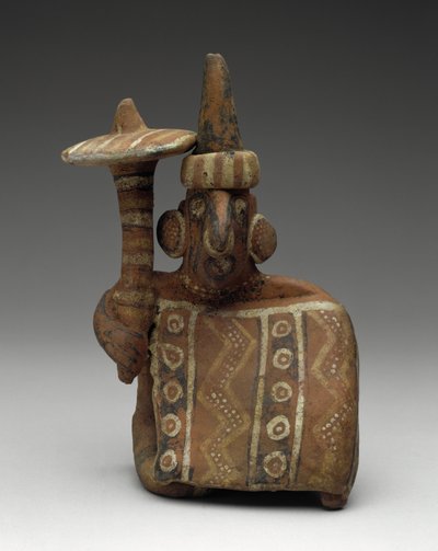 Seated Male Figure Holding a Mace by Nayarit Nayarit