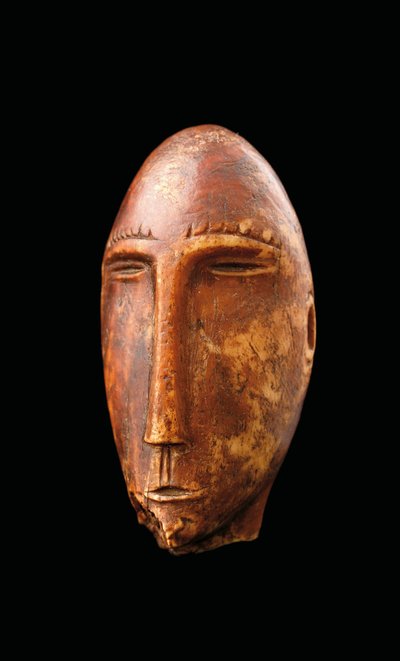 Head, Old Bering Sea by Okvik Culture