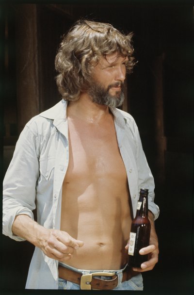 Kris Kristofferson with beer by Orlando Suero
