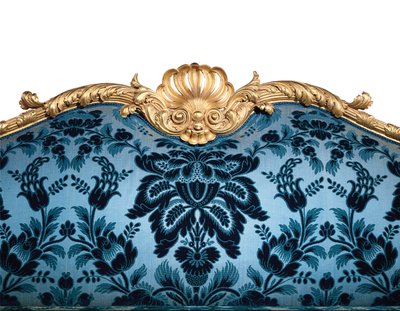A George III giltwood sofa by Robert Adam