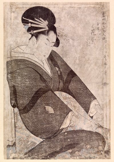 Seated Japanese woman by School Japanese