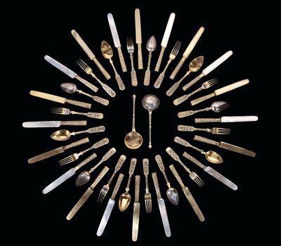 A silver-gilt and niello flatware service by School Russian