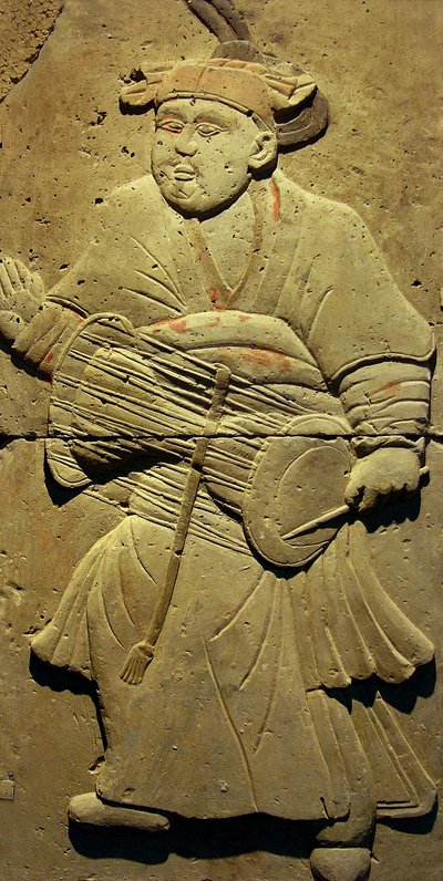 Stele depicting a musician by Tang Dynasty Chinese School