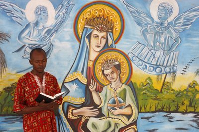 African Man Reading the Bible, Togoville, Togo by Unbekannt