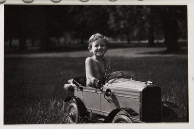 Boy driving a toy pedal car, c 1930 by Unbekannt
