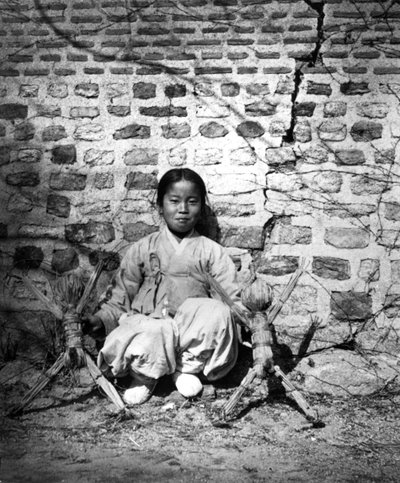Child Sitting by a Wall, Korea by Unbekannt