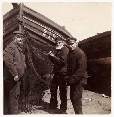 Fishermen standing by a net, c 1905 by Unbekannt