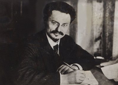 Leon Trotsky at his writing desk, Early 1920s by Unbekannt
