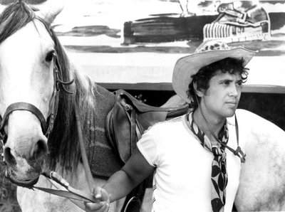 Lucio Battisti with a horse by Unbekannt