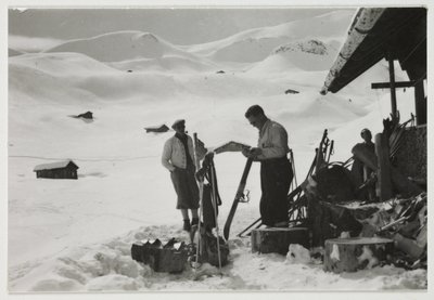 Skiers outside a chalet, c 1930 by Unbekannt