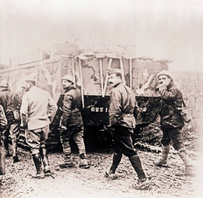 Soldiers Walking Behind Tank, c1914-c1918 by Unbekannt