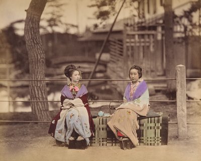 Two Japanese Women Sitting on a Bench by Unbekannt