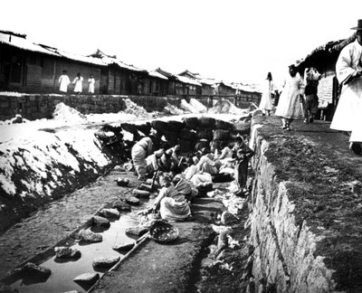 Washing Clothes Outdoors, Korea by Unbekannt