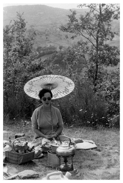 Woman under a Parasol Having a Picnic, c1950-1969 by Unbekannt