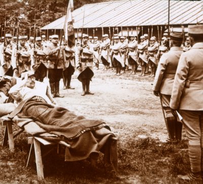 Wounded officer salutes the flag, c1914-c1918 by Unbekannt
