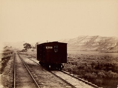 Railroad Car on Tracks by Unknown artist