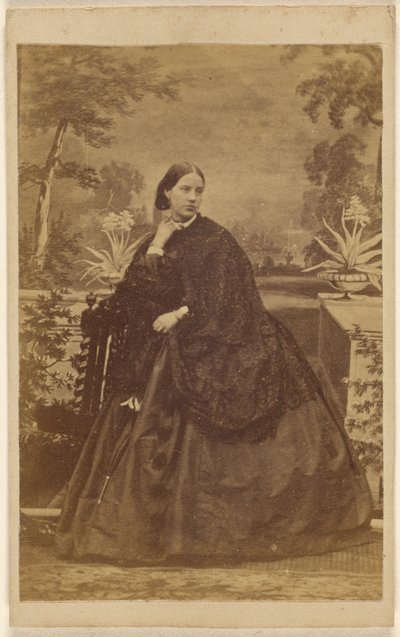 Unidentified woman seated, with hand to collar by Unknown artist