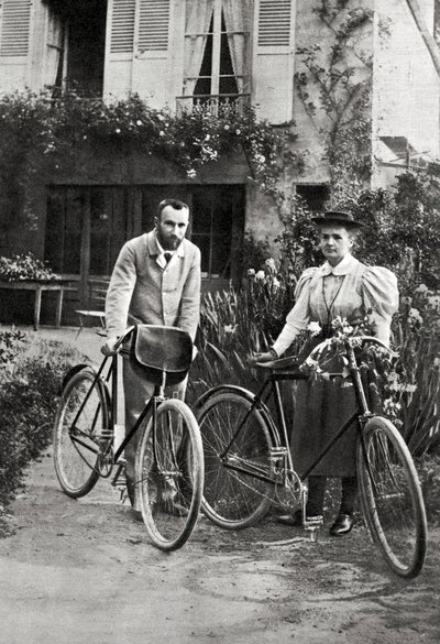 Pierre and Marie Curie in their garden by Unknown photographer
