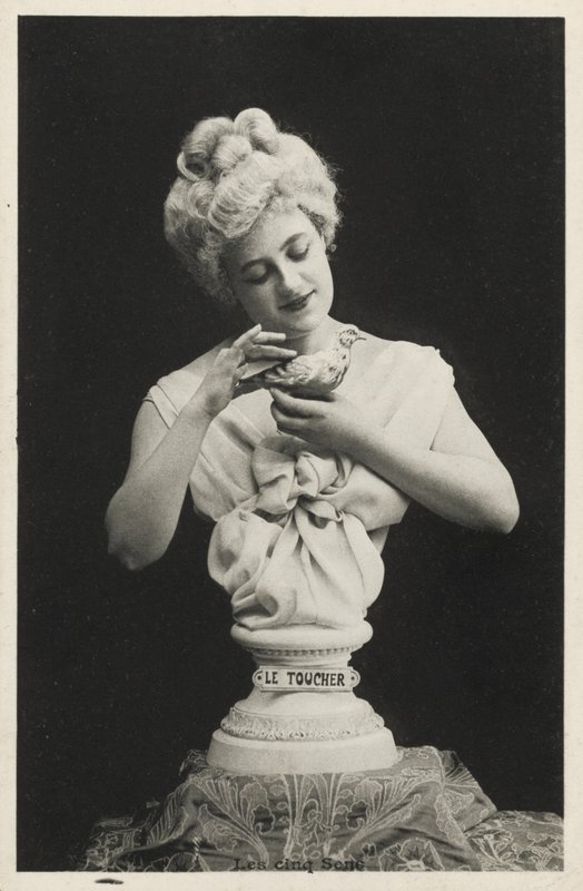 Bust of a woman with a bird by French Photographer