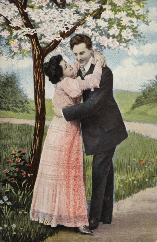 Couple Embracing Under a Blossom Tree by English Photographer