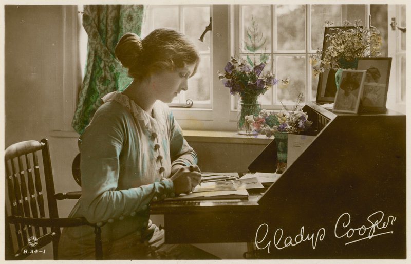 Gladys Cooper at desk by English Photographer