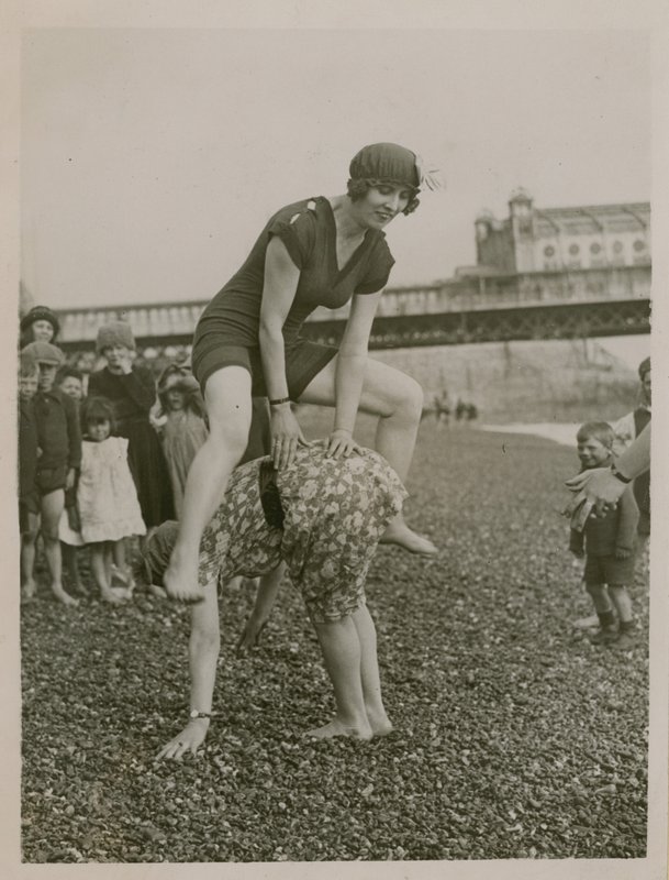 Leapfrogging on Brighton Beach by English Photographer