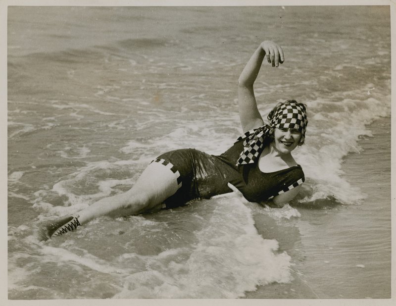 Posing on Brighton Beach by English Photographer