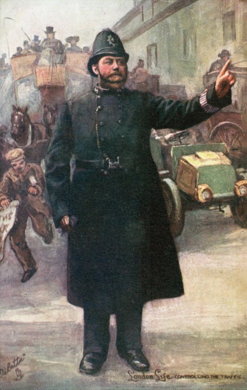 Policeman controlling traffic by English School