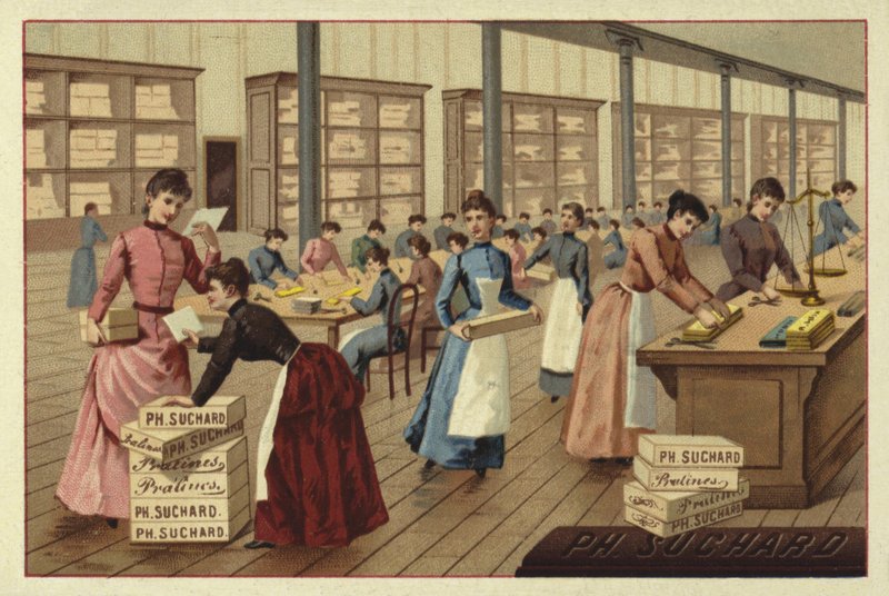 Packing chocolates in a factory by European School