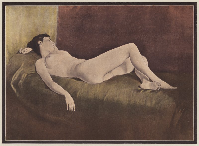 Woman lying on a bed by European School