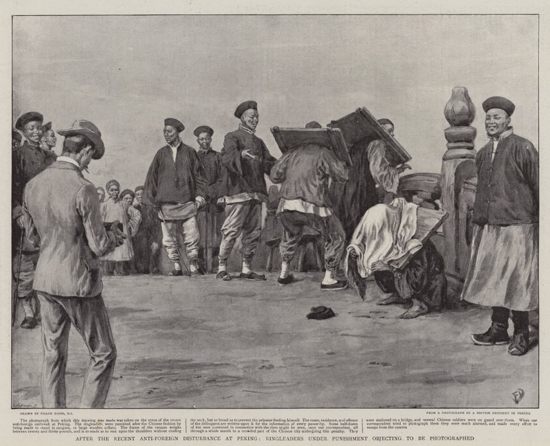 After the Recent Anti-Foreign Disturbance at Peking, Ringleaders under Punishment objecting to be photographed by Frank Dadd