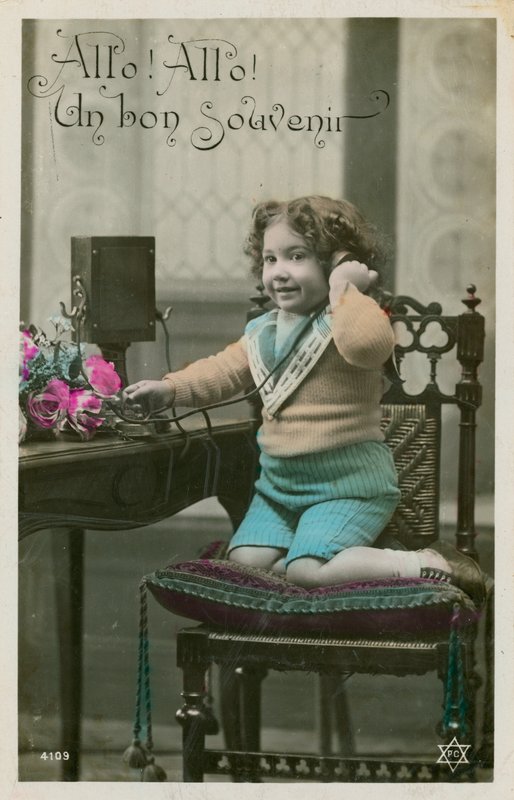 Child using telephone by French Photographer