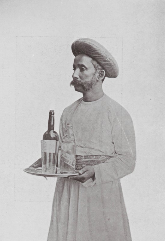 Bombay / Mumbai: The Table-boy by Indian photographer