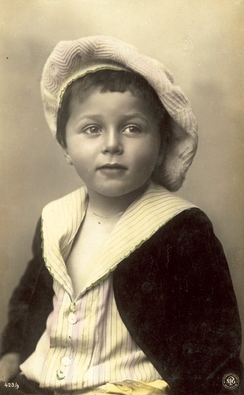 Cute Boy in Floppy Hat by Italian Photographer